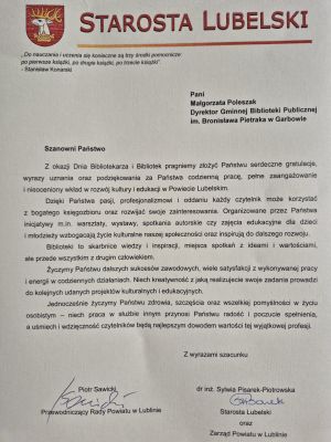 List z życzeniami dla kadry biblioteki z okazji Dnia bibliotekarza